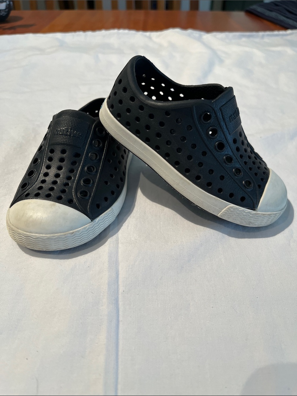 Black Native shoes, size C5